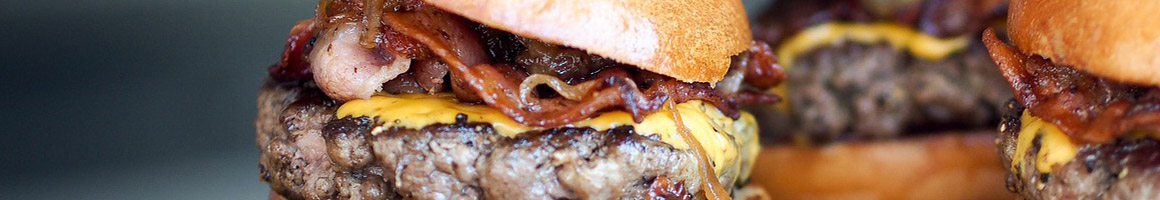 Eating Burger Fast Food at Burger Street restaurant in Dallas, TX.